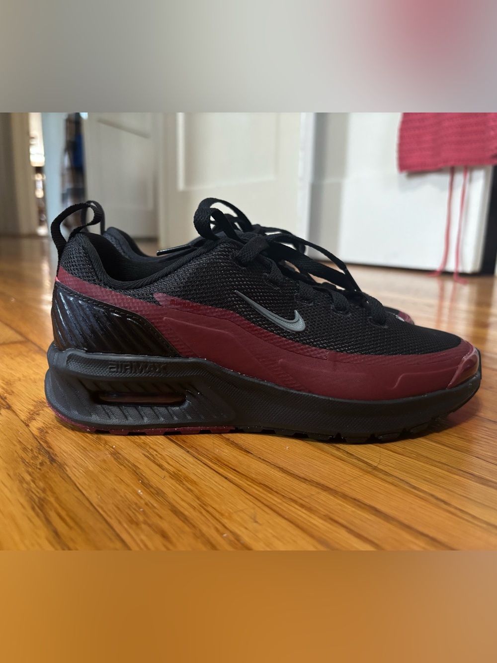 Nike Kids Black Sneakers with Burgundy Toe Trim
